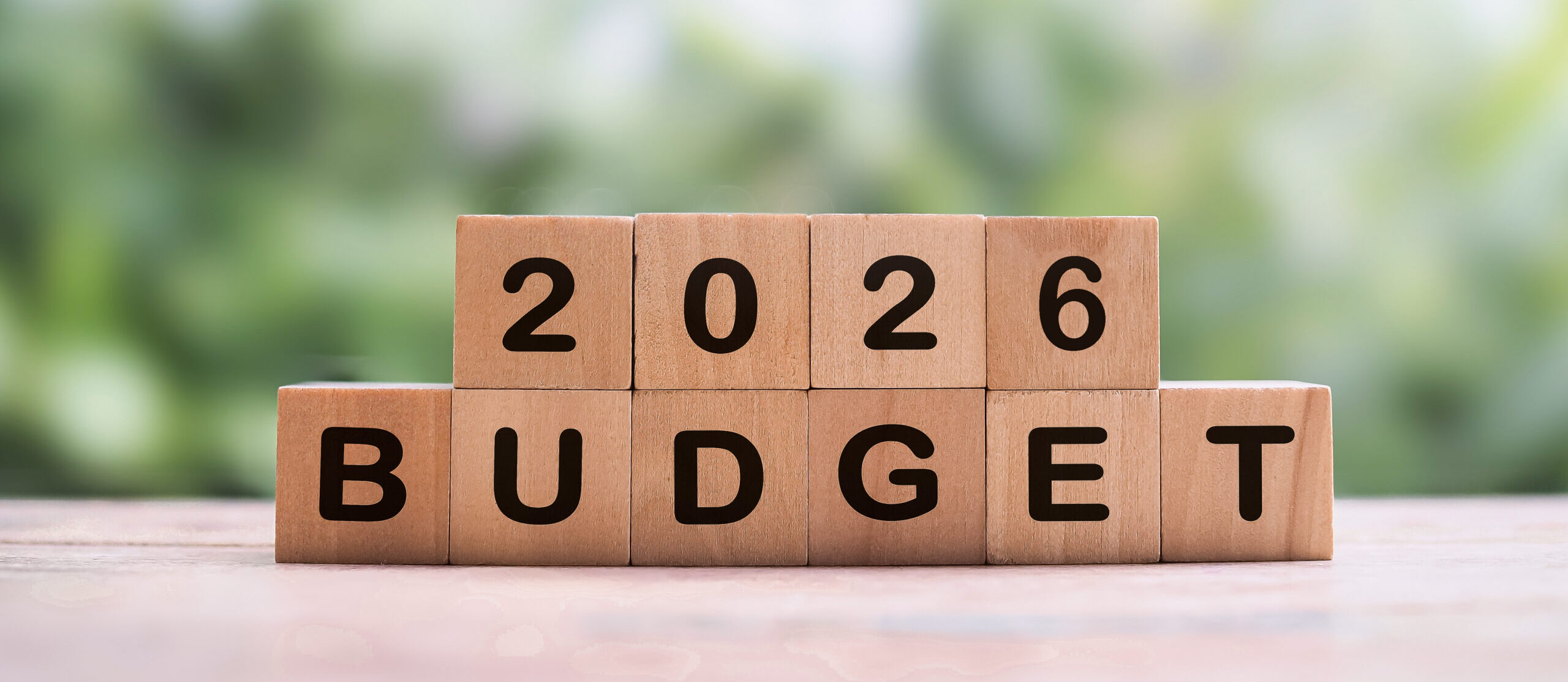 Wooden blocks with the word BUDGET and number 2026. The concept about budget planning and allocation in year 2026